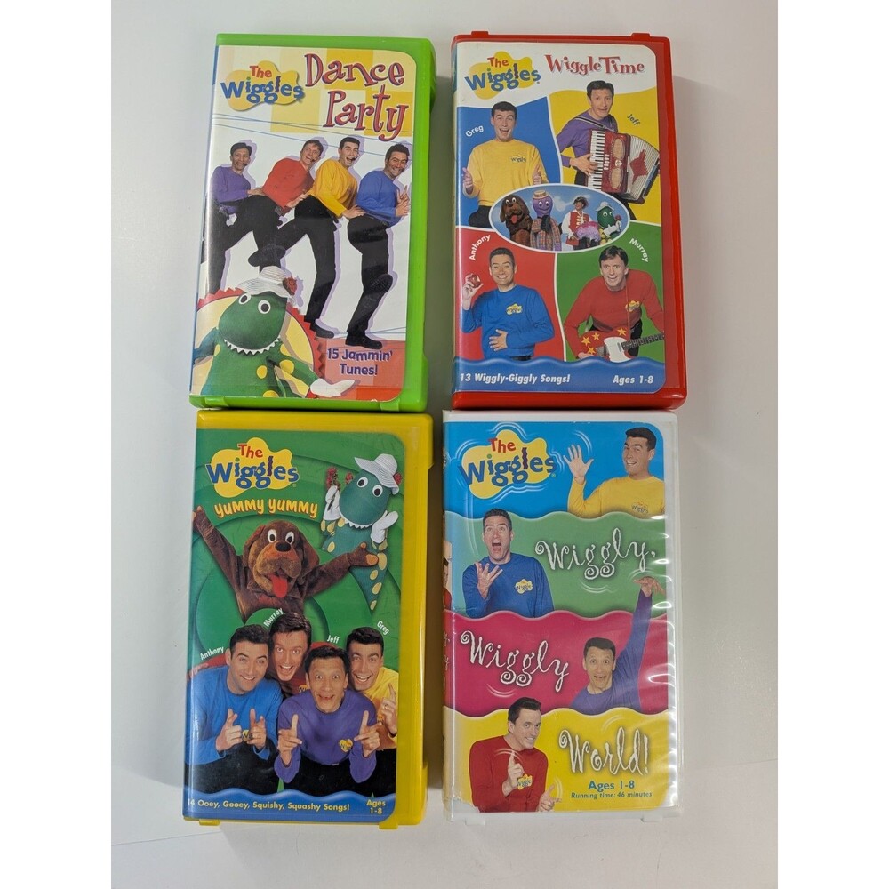 The Wiggles VHS Lot of 4 Dance Party Wiggle Time Yummy Yummy Wiggly World
